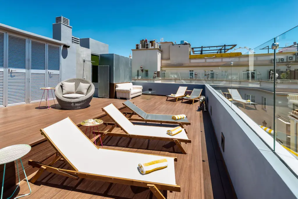 Where to Stay in Malaga? 3 Best Areas & Places to Stay + Nearby Holiday Towns 🇪🇸 53 Mariposa Hotel, rooftop with sunbeds