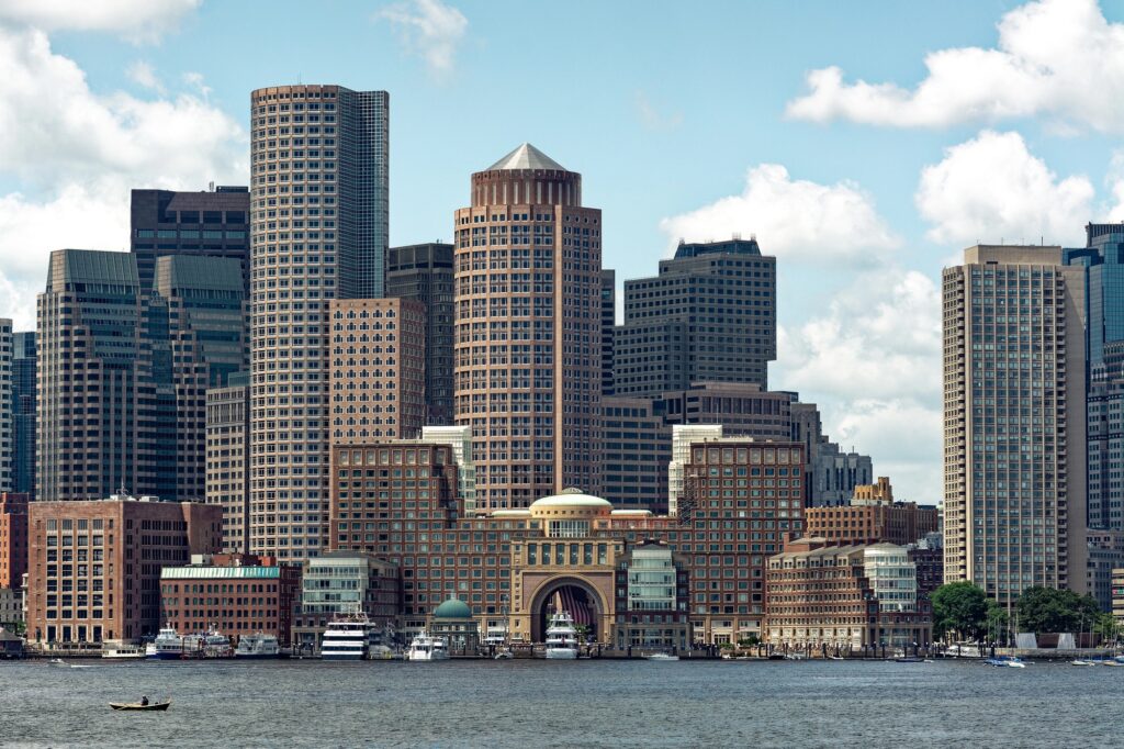 Boston waterfront buildings and skyscrapers seen from across the harbour