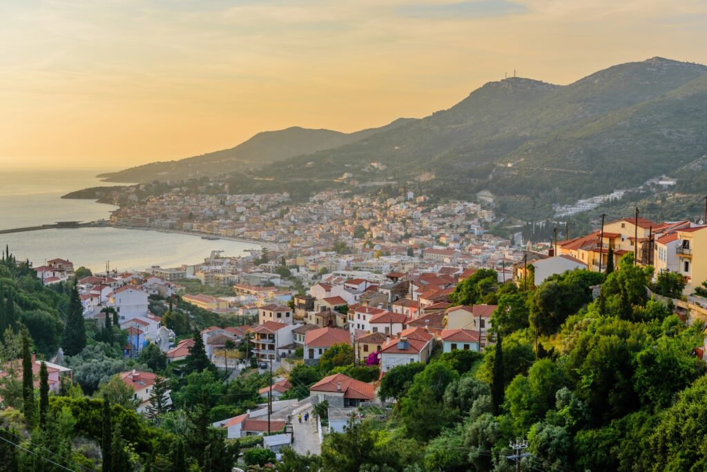 View over Samos Town, its bay and the surrounding hills at sunset