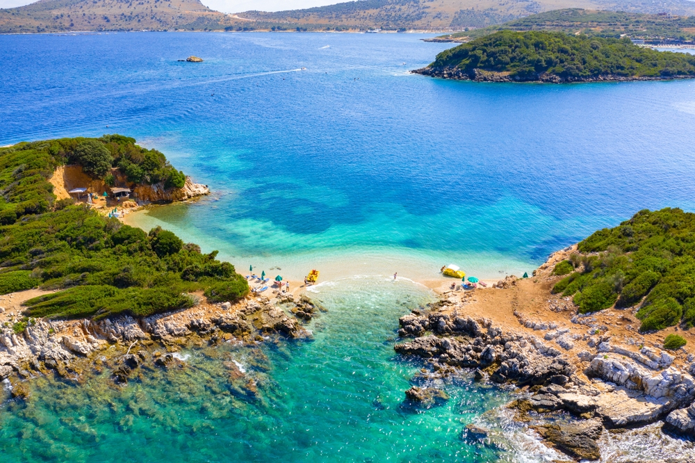 Bora Bora beach in Ksamil with the small islands out in the water