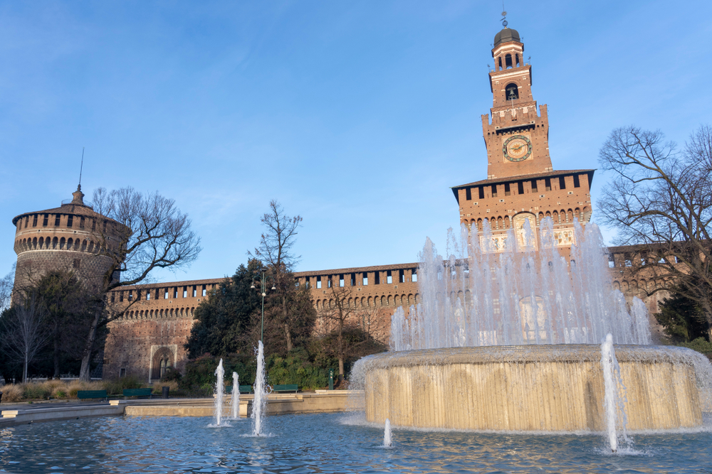 Filarete Tower and fountain outside Castello Sforzesco in Milan