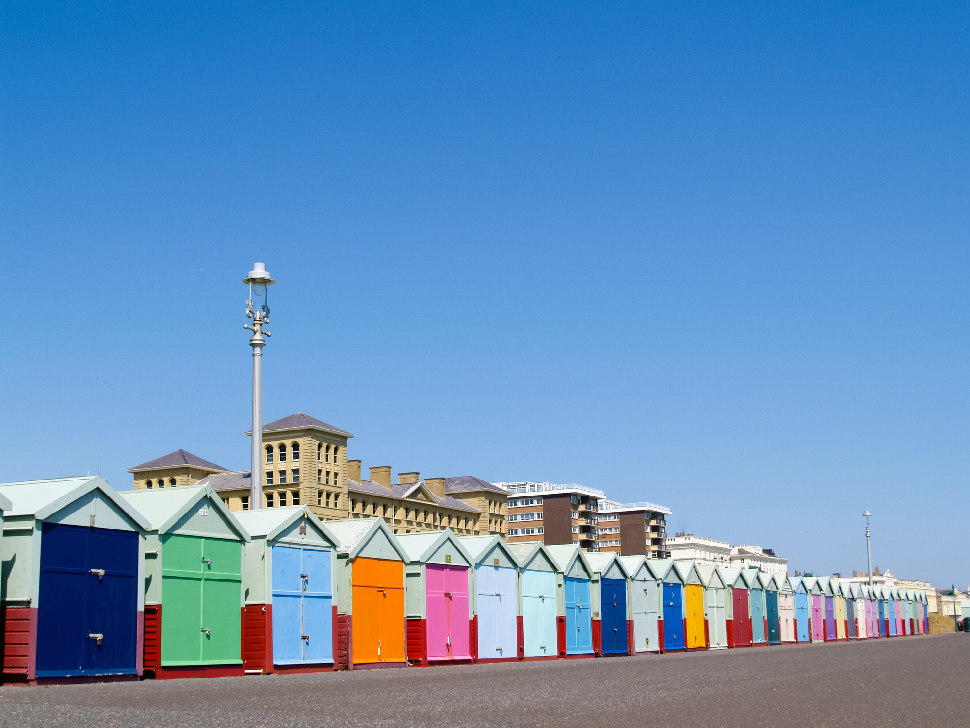 Colourful beach huts on the seafront in Hove
