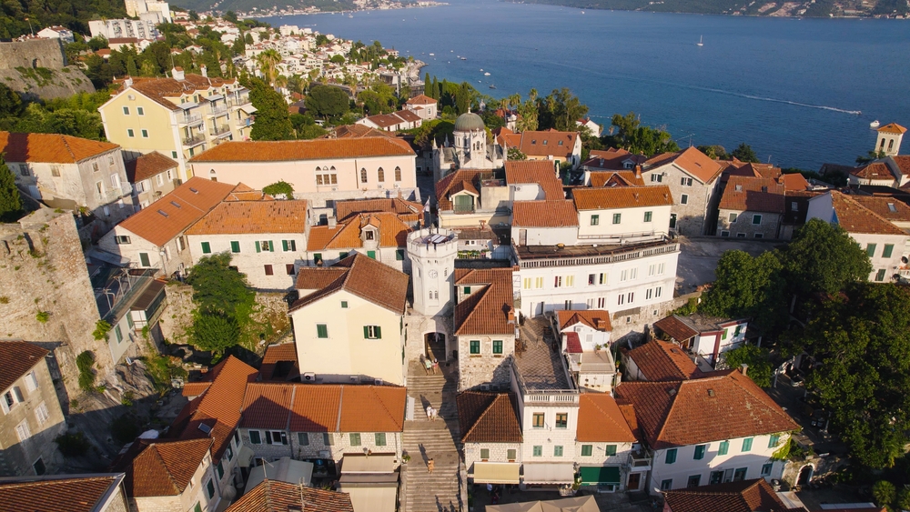 The clock tower and Old Town rooftops in Herceg Novi