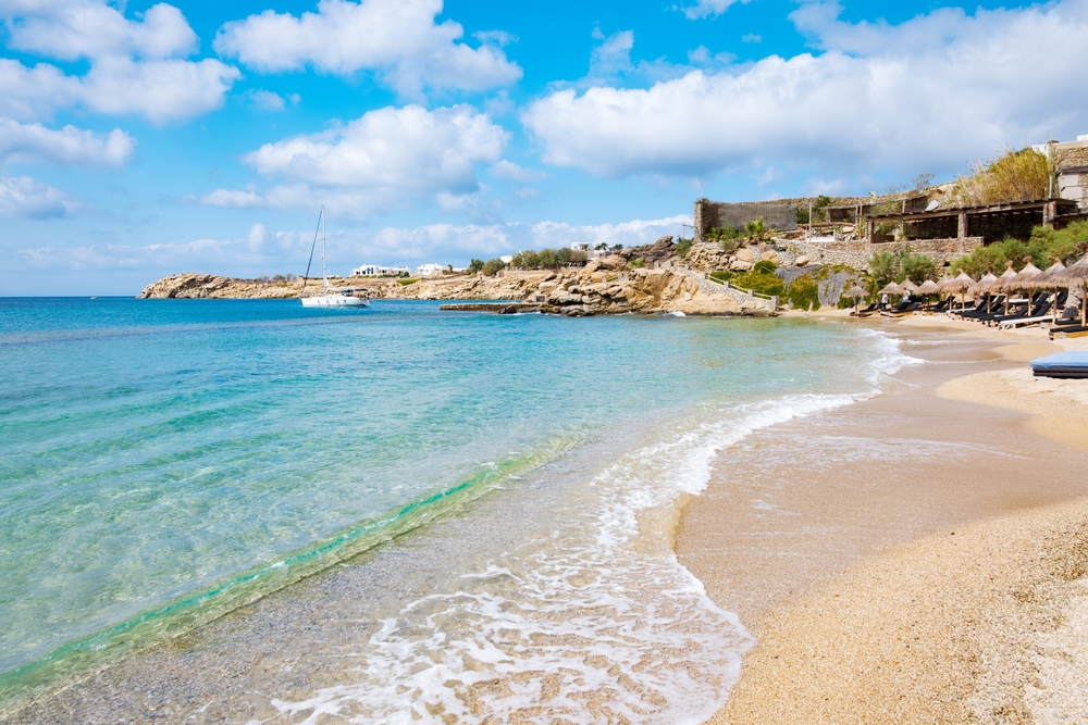 Sunbeds and parasols on Paradise Beach in Mykonos