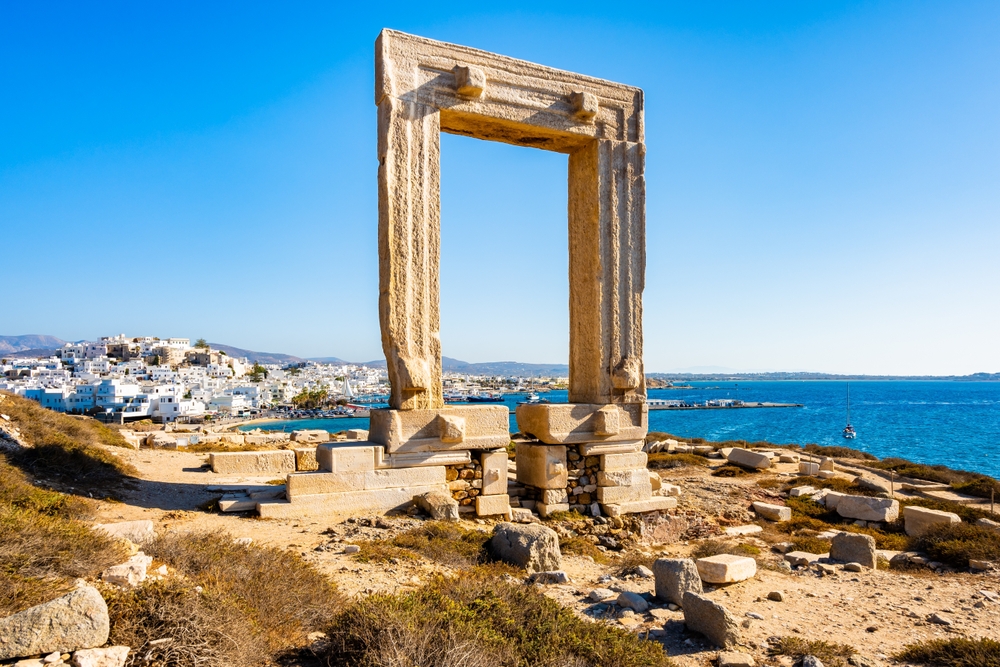 Portara, the gateway of the Temple of Apollo, overlooking the harbour and Naxos Town