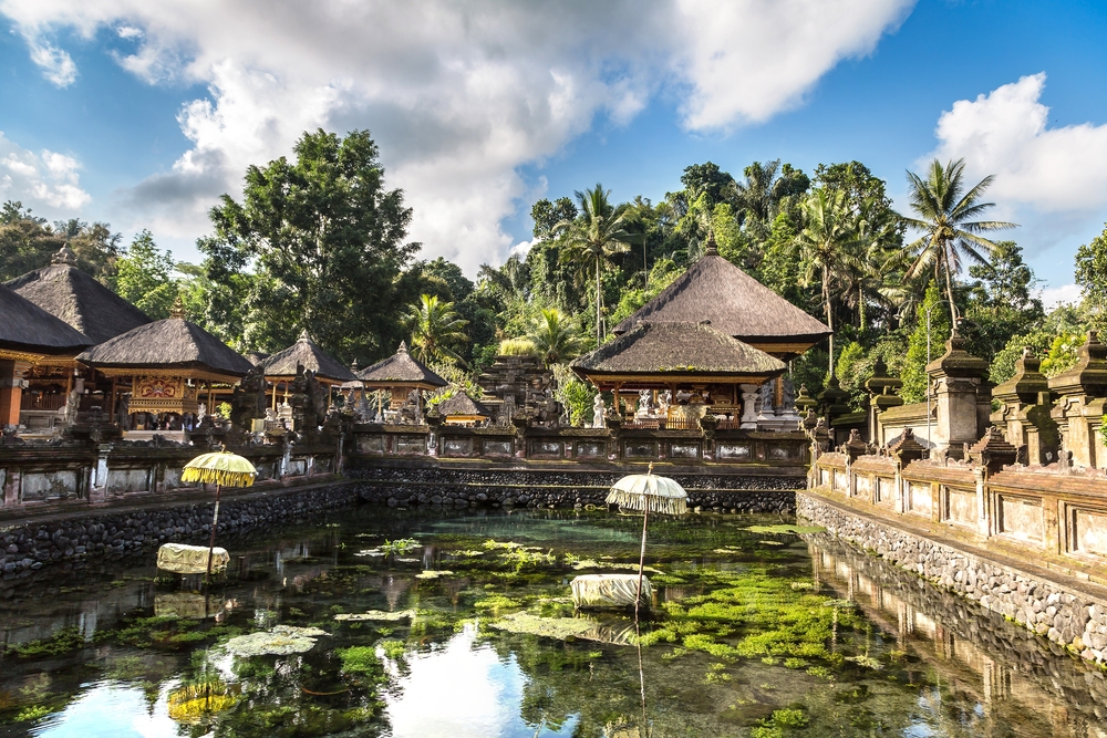 Sacred spring-water pool at Tirta Empul Temple in Bali