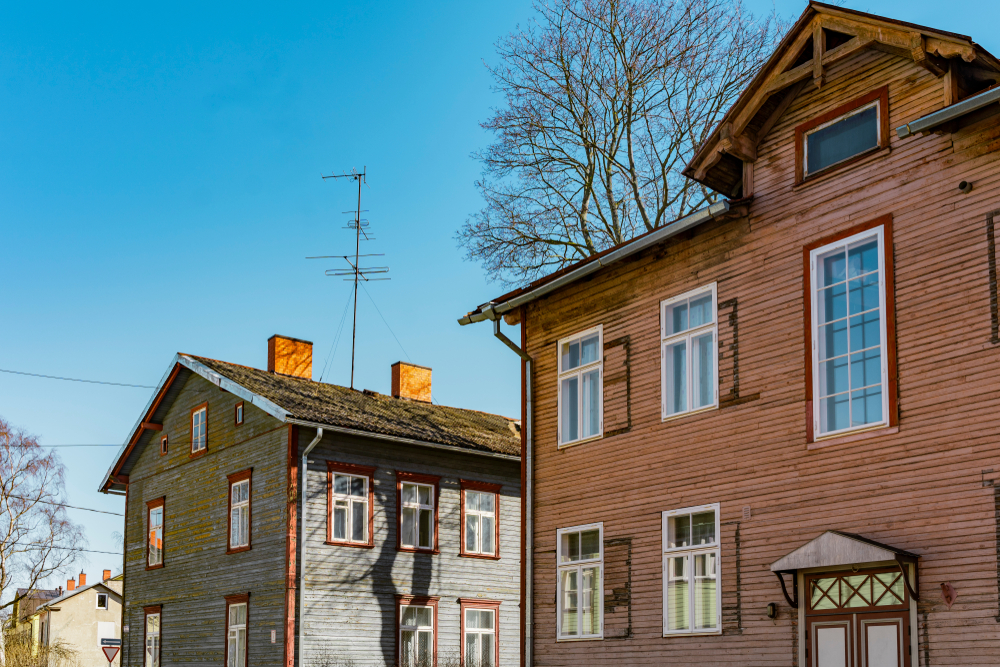 Street with traditional colourful houses in Kalamaja in Tallinn