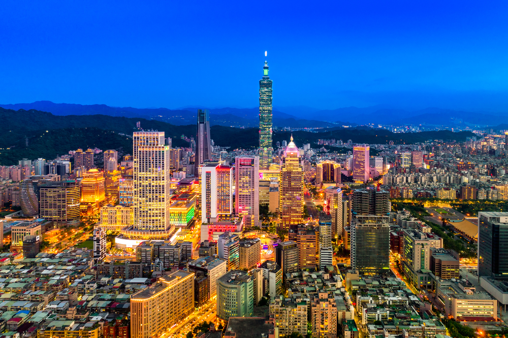 Taipei 101 and a busy street in the Xinyi business district in Taipei