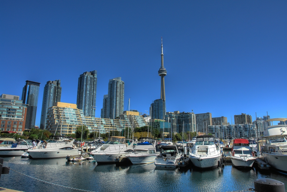 The Marina Quay West marina on Queens Quay at Harbourfront in Toronto with the CN Tower in the background