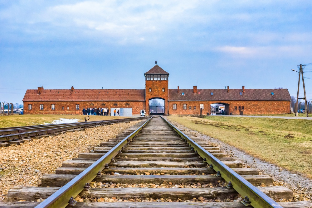The gatehouse and railway track at Auschwitz-Birkenau seen from inside the camp