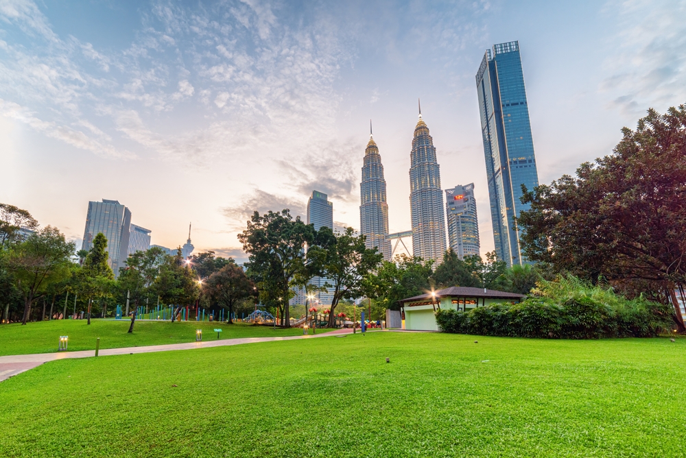 The lawn in KLCC Park with the Petronas Twin Towers in the background