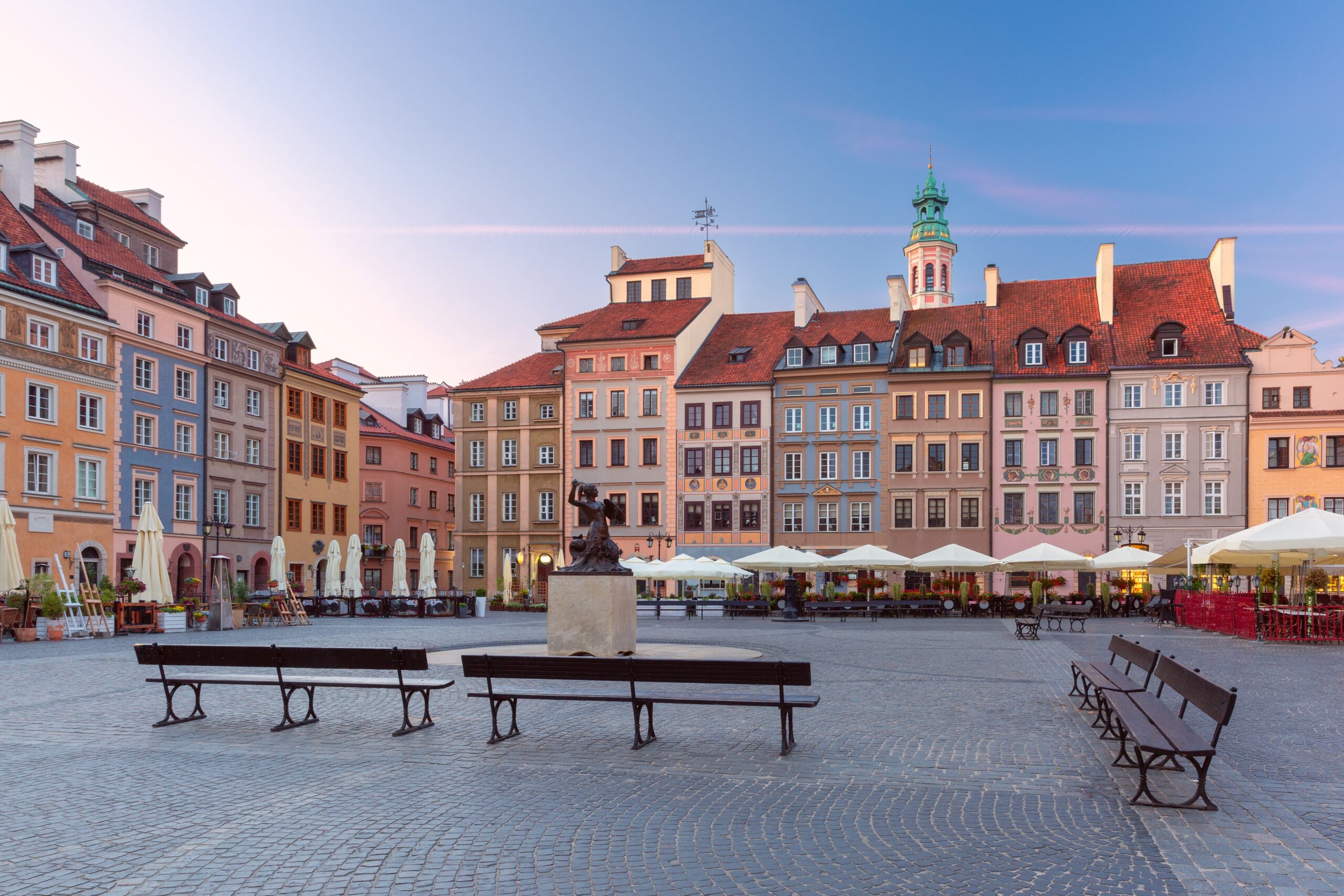 The market square in Warsaw's Old Town with colourful houses early in the morning