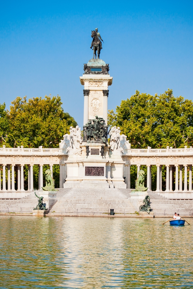 18 Best Things to Do in Madrid: Sights, Prices & Tips 21 The monument to Alfonso XII by the Estanque Grande lake in Retiro Park in Madrid