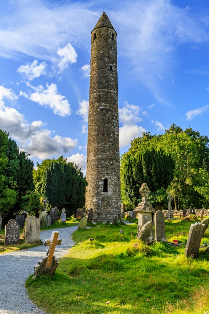 18 Best Things to Do in Dublin: Sights, Prices & Tips 34 The round tower and graveyard at the monastery in Glendalough