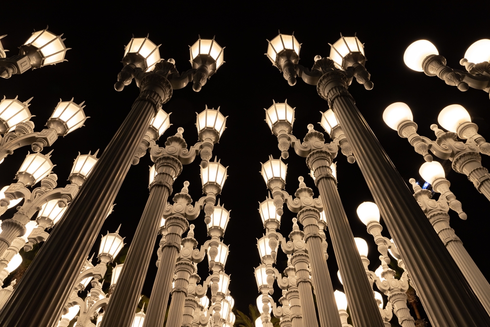 The street lamps of Urban Light at LACMA in the evening