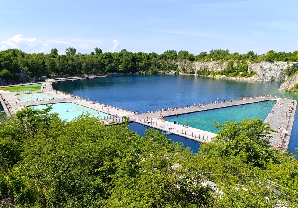 The turquoise Zakrzówek quarry in Krakow with its bathing walkways