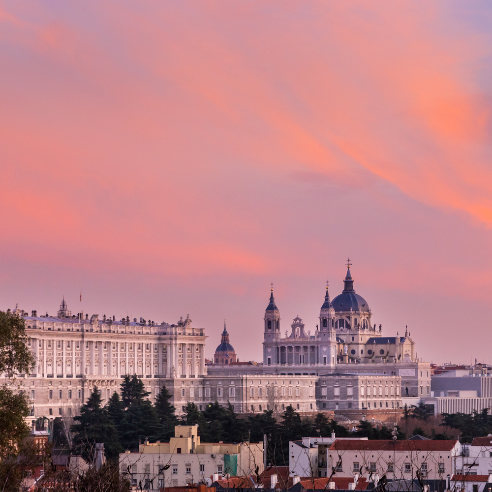 Madrid's skyline with Almudena Cathedral and the Royal Palace at sunset