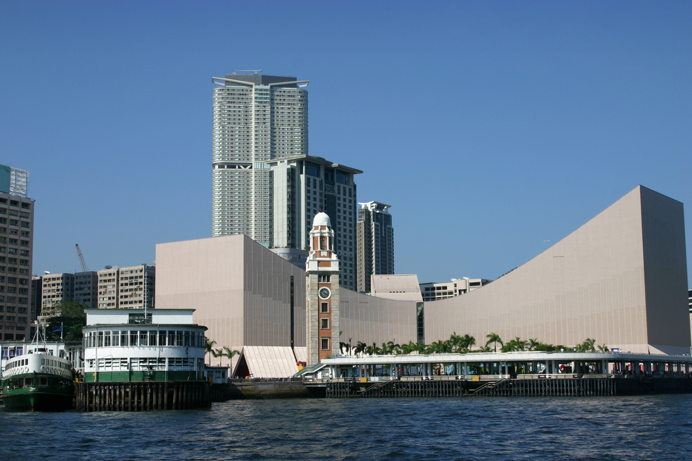 Tsim Sha Tsui seen from Victoria Harbour with the Clock Tower and the ferry terminal