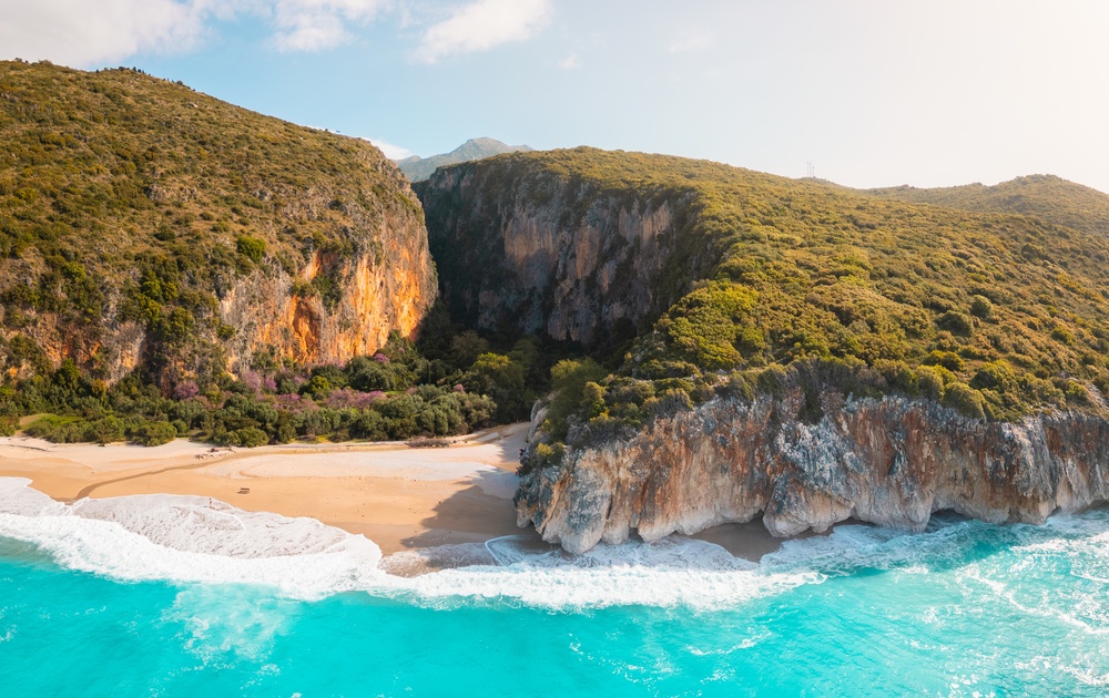 Aerial view of Gjipe beach and the canyon behind it on the Albanian Riviera