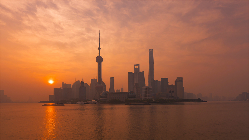 Lujiazui skyline seen from The Bund in Shanghai at sunset