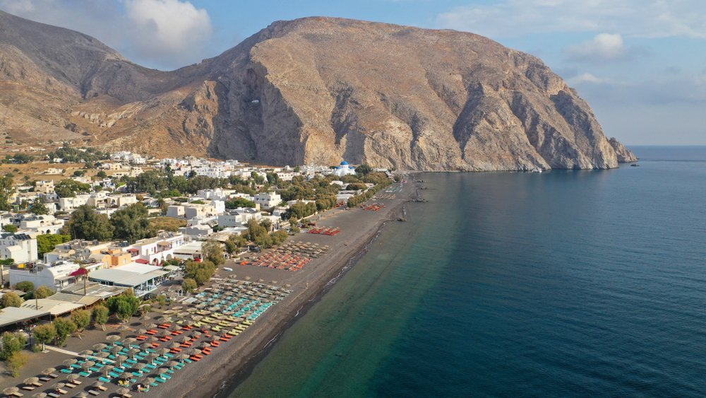 aerial view of the black beach and bay at Perissa