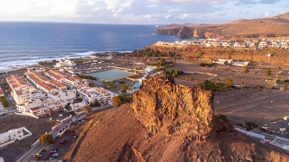 17 Best Things to Do in Gran Canaria: Sights, Prices & Tips 14 Aerial view of Agaete and the harbour of Puerto de las Nieves on Gran Canaria at sunset