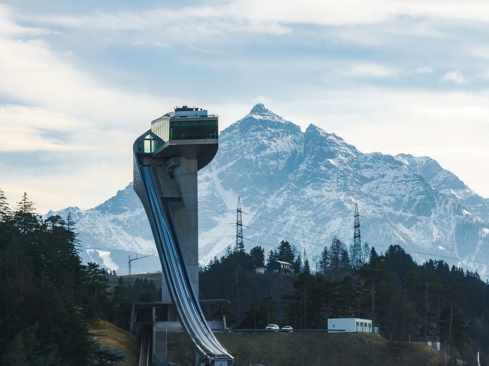 The Bergisel ski jump in Wilten, Innsbruck, with the mountains in the background