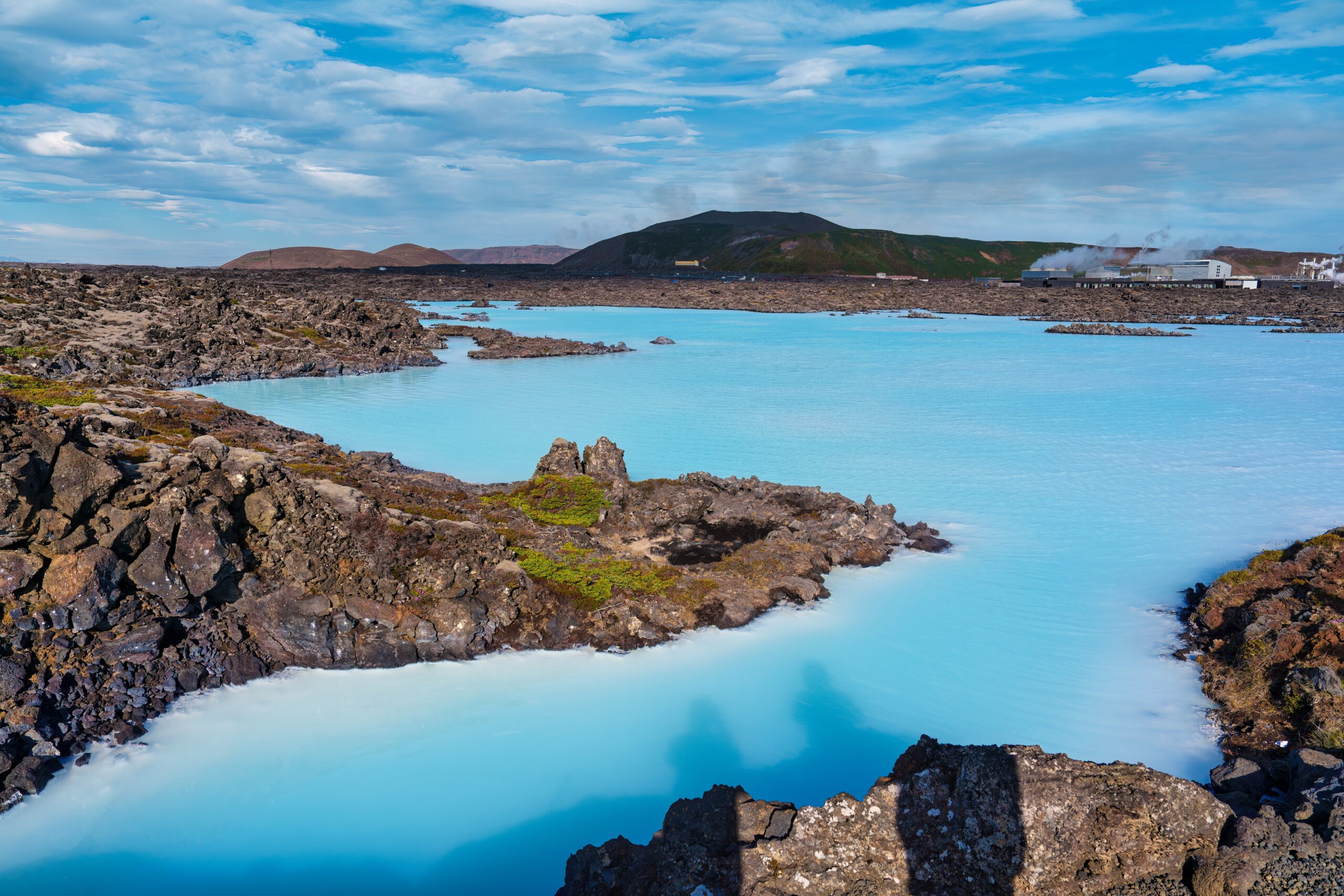 The Blue Lagoon between lava rocks