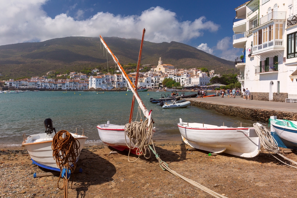 The church of Santa Maria and the boats in the harbour in Cadaqués