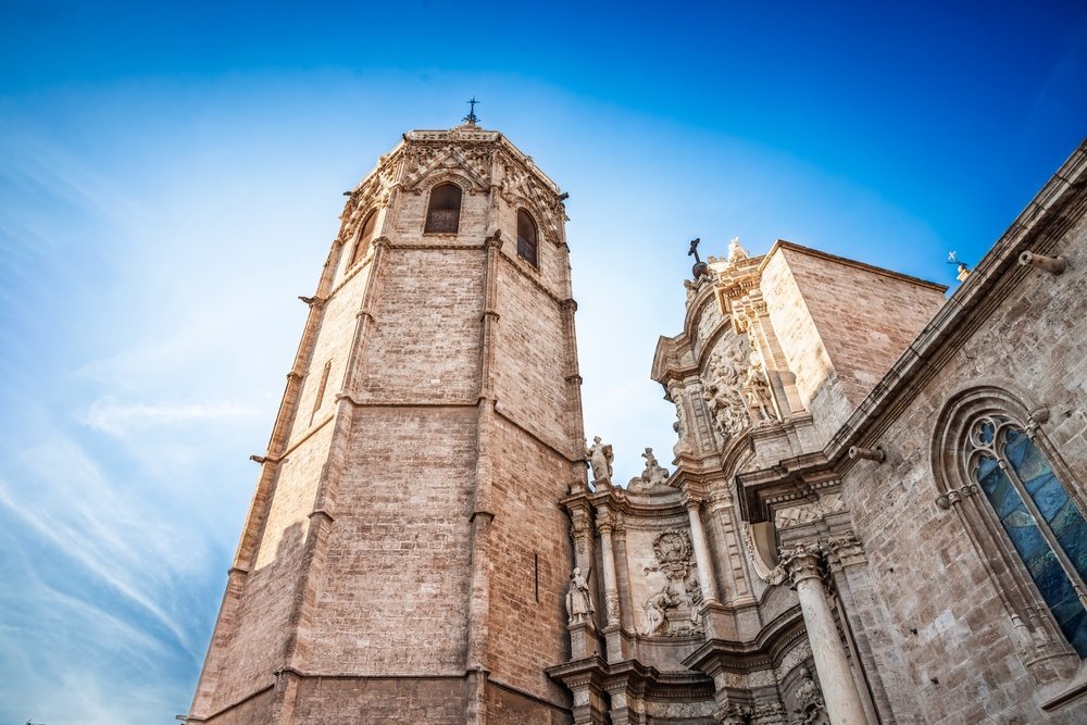 The cathedral's Baroque doorway and the Miguelete tower seen from below