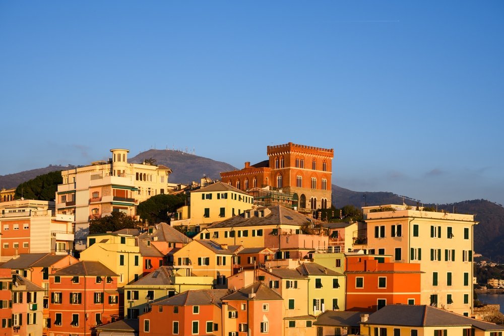 Colourful houses and the small beach in the fishing village of Boccadasse in Genoa