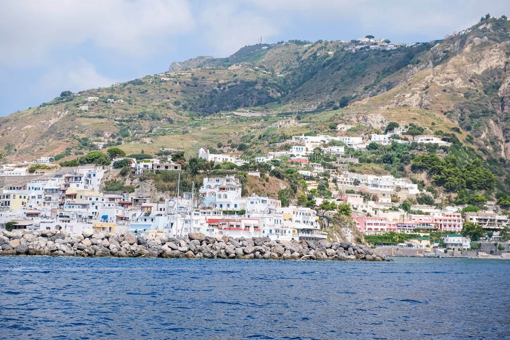 Where to Stay on Ischia? The 6 Best Areas & Places to Stay 8 Colourful houses and the stone pier in Sant'Angelo on Ischia