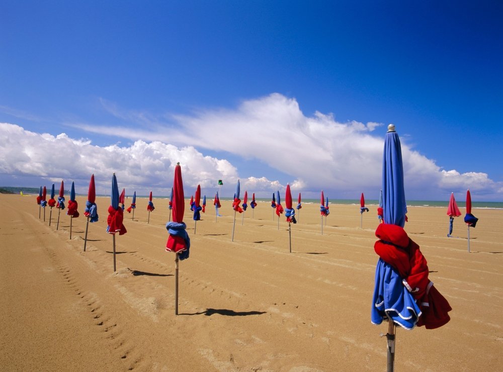The colourful parasols on the beach in Deauville, Normandy