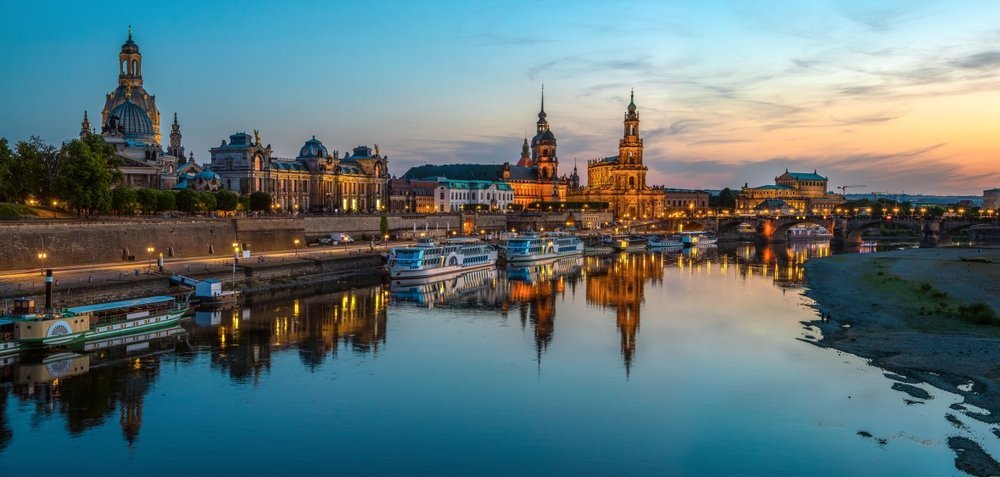 Dresden's Old Town with church spires and the Augustusbrücke over the Elbe in evening light