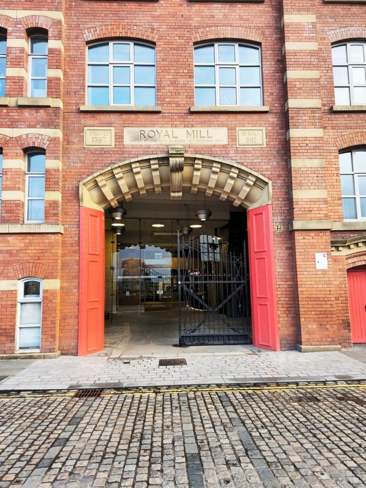 Things to Do in Manchester - The 18 Best Sights & Experiences in the City of Football and Music 8 The entrance to the old Royal Mills cotton mill in Ancoats