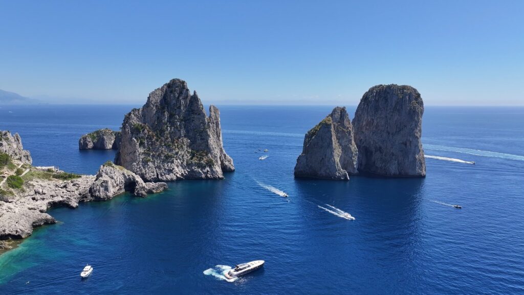 Where to Stay on Capri? The 5 Best Areas & Places to Stay 7 The Faraglioni rocks off Capri