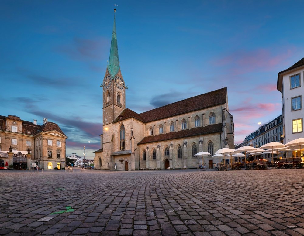 The Fraumünster with its green spire seen from Münsterhof in Zürich