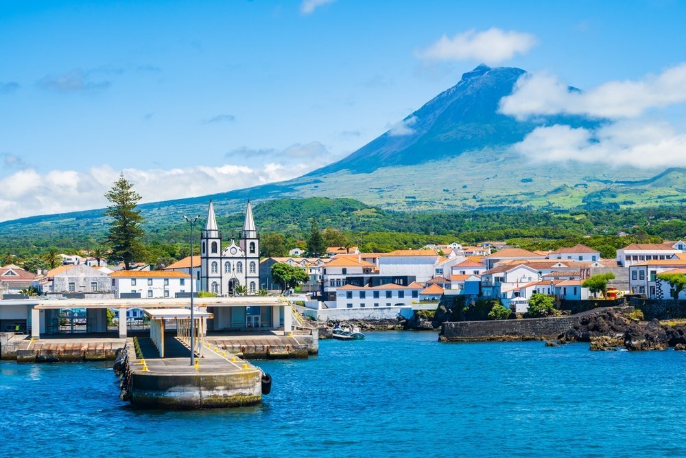 Where to Stay in the Azores? The 7 Best Areas & Places to Stay 9 The harbour in Madalena with the Pico volcano behind it