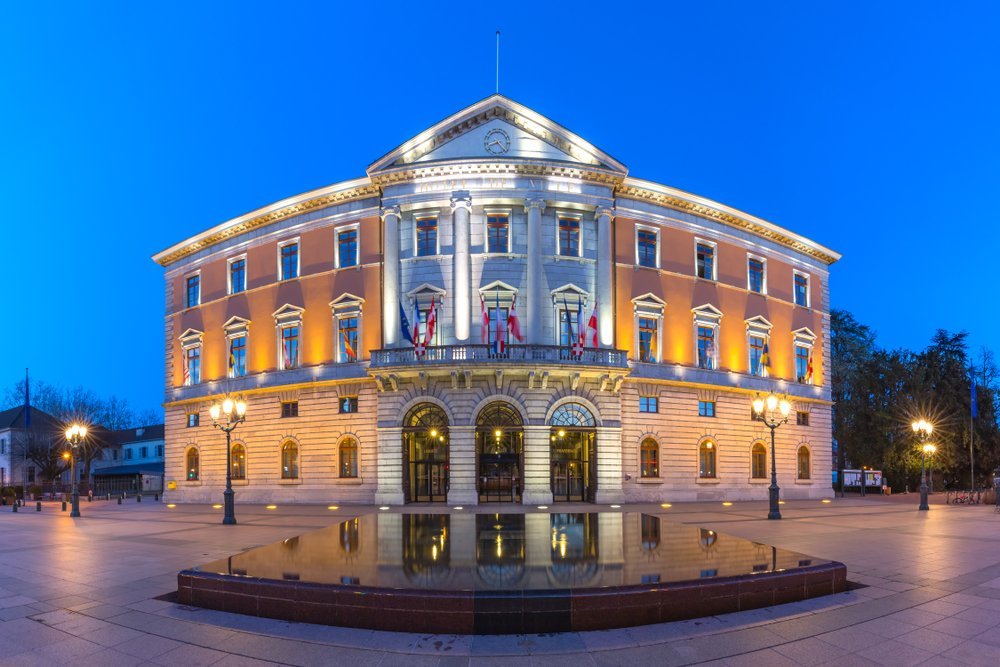 The Hôtel de Ville town hall in Annecy's centre by the lake at blue hour