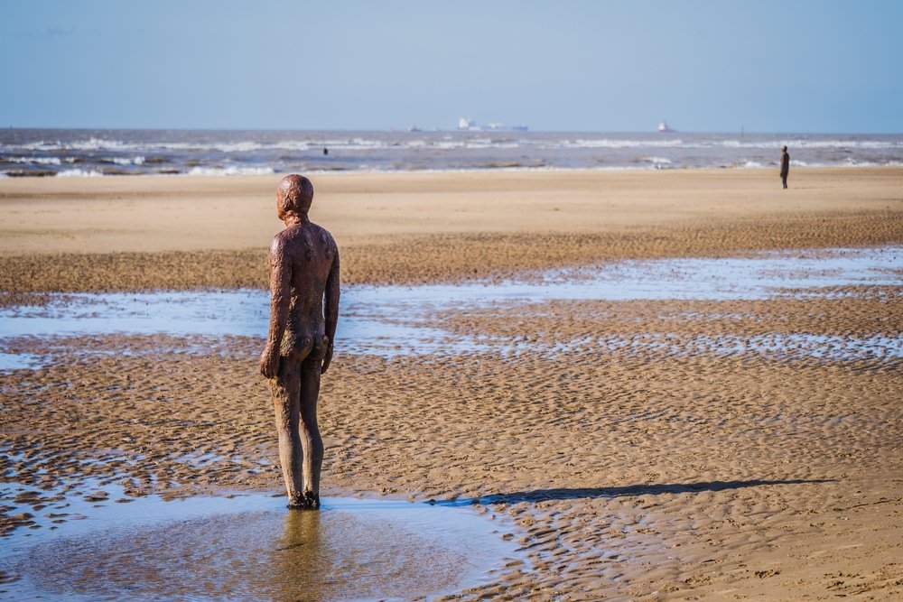 Things to Do in Liverpool: The Beatles, Anfield and 16 Other Reasons to Go 17 Iron figures from Another Place by Antony Gormley on Crosby Beach