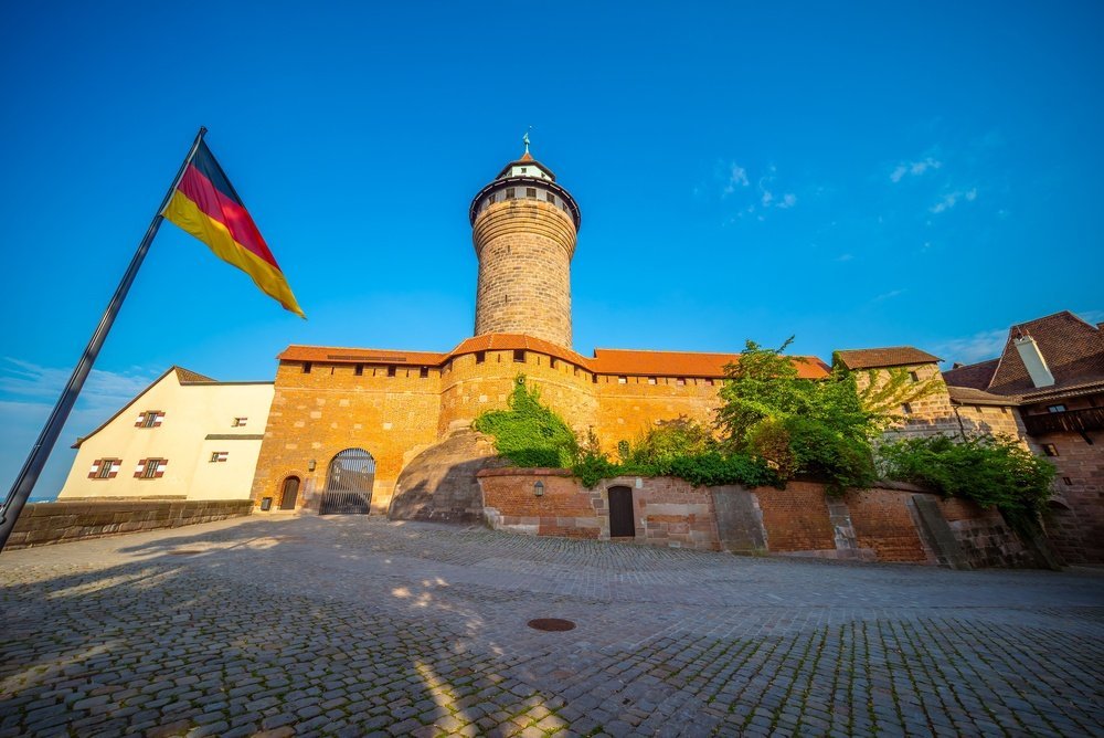 The Kaiserburg imperial castle with the Sinwellturm tower above Sebald in Nuremberg