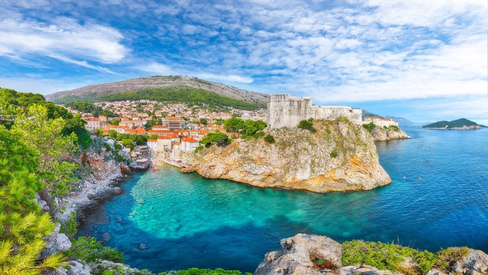 Kayaks on the sea beneath the city walls and Bokar Fortress in Dubrovnik