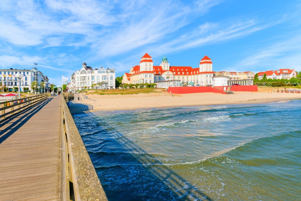 The Kurhaus and sandy beach in the seaside resort of Binz on Rügen on the Baltic Sea