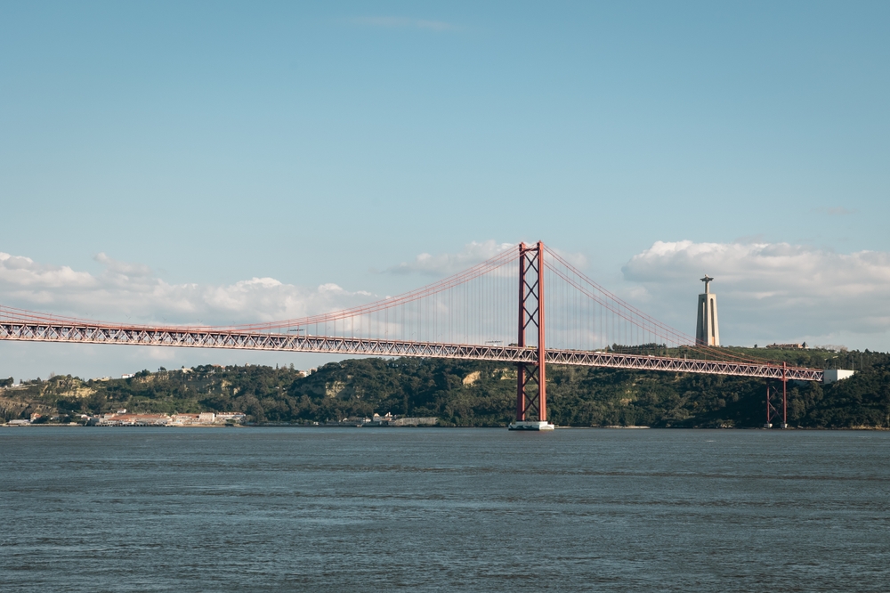 20 Best Things to Do in Lisbon: Sights, Prices & Tips 38 25 de Abril Bridge and Cristo Rei across the Tagus in Lisbon