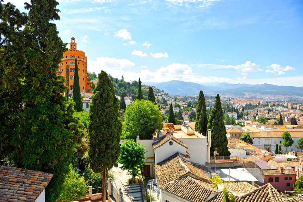 Panorama over the El Realejo neighbourhood in Granada with the Sierra Nevada in the background