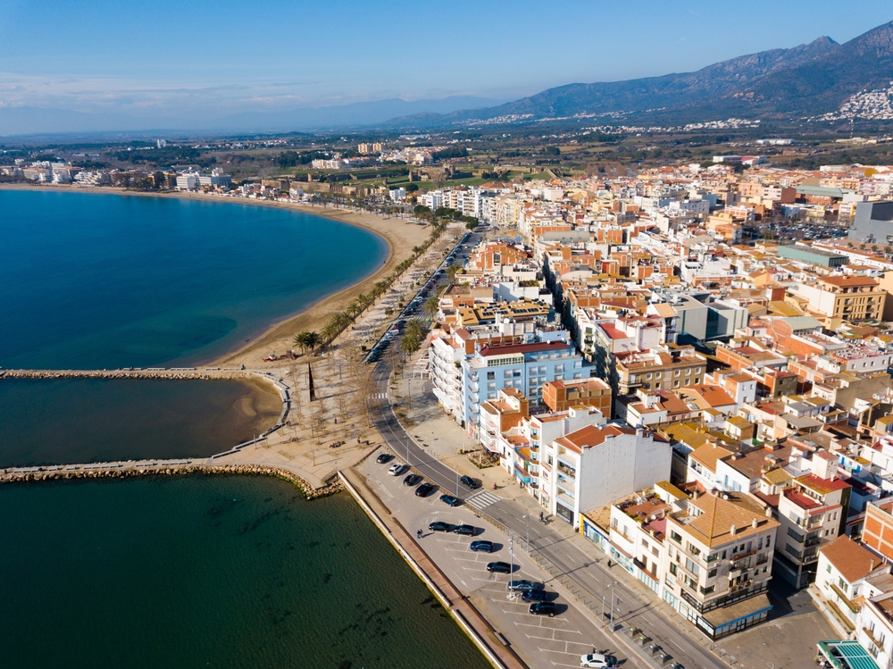 Aerial view of the resort of Roses on the Costa Brava with the beach and promenade