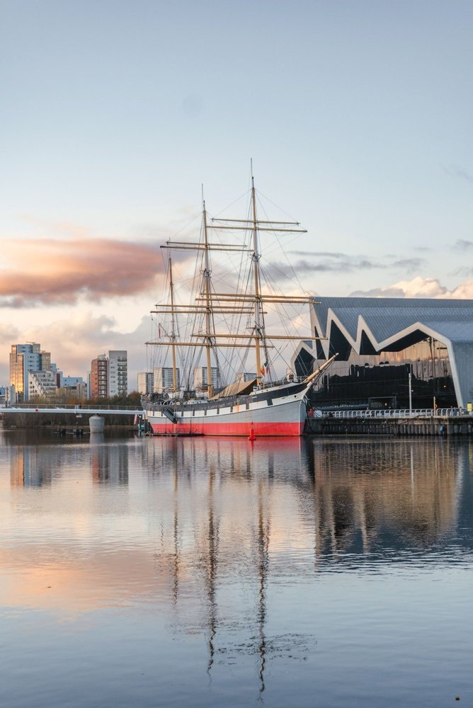 The sailing ship Glenlee by the Riverside Museum on the River Clyde in Glasgow
