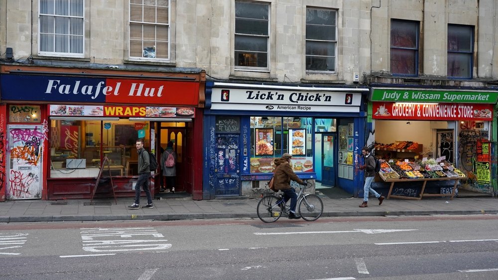 Shops and murals on Stokes Croft in Bristol