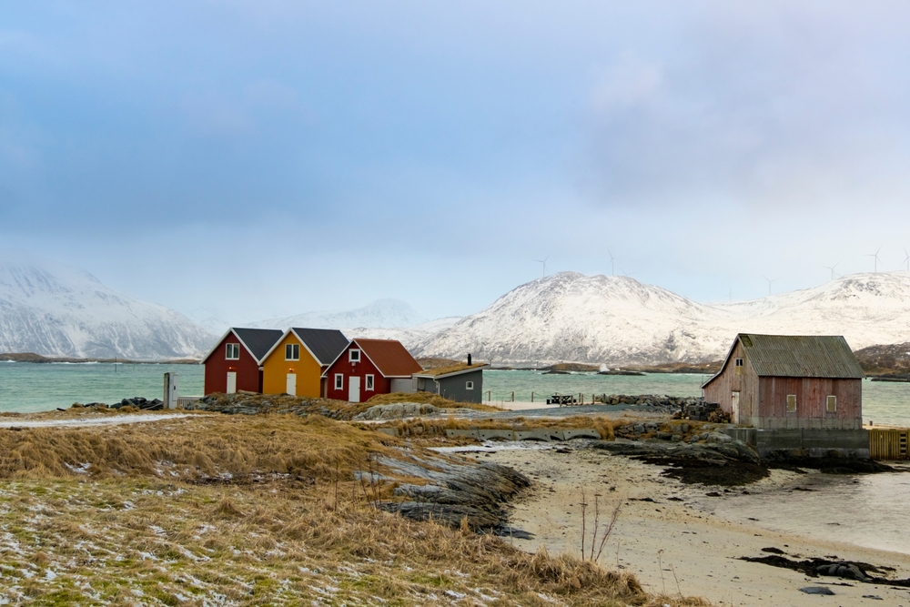 Where to Stay in Tromsø? The 6 Best Areas & Places to Stay 13 Winter landscape on Sommarøy with rorbu cabins by the water