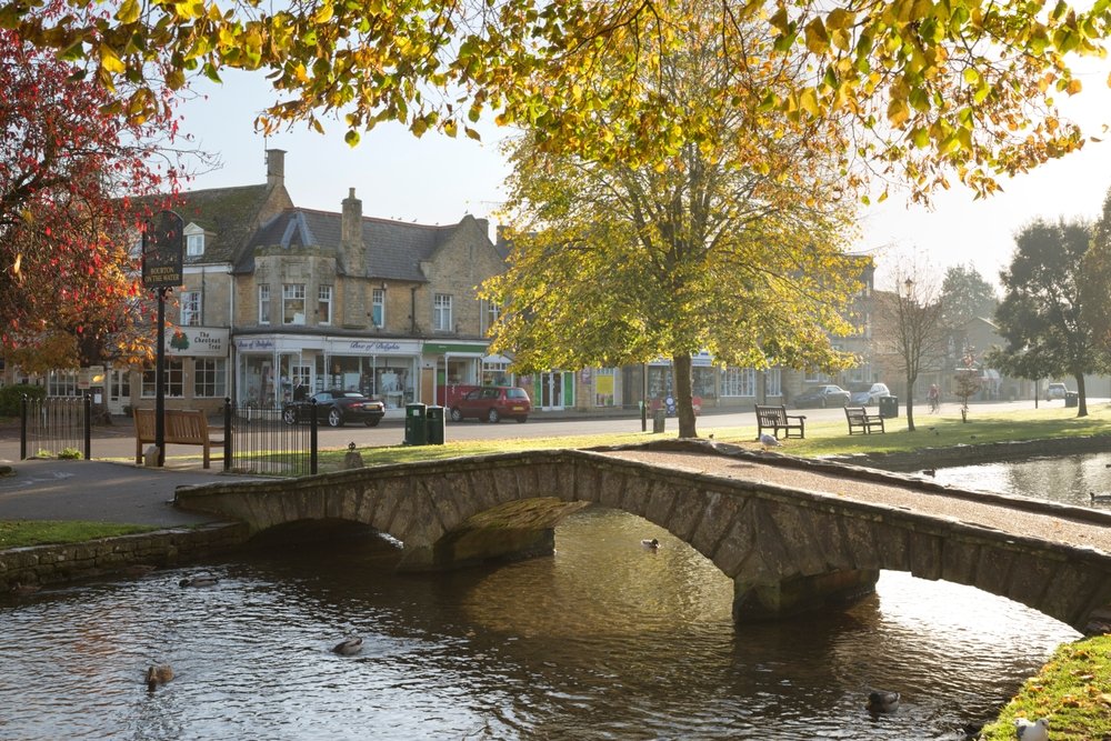 Stone bridge over the River Windrush in Bourton-on-the-Water in the Cotswolds
